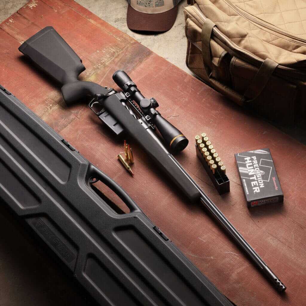 Springfield Armory Model 2020 Waypoint bolt-action rifle with an SG-100 Cerakote stock, scope, ammunition, and hard case.