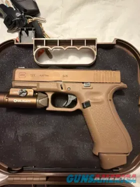 Glock 19X 9mm with Olight weapon light