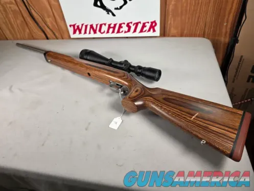 9379  Savage Model 12, 22-250,laminated ...
