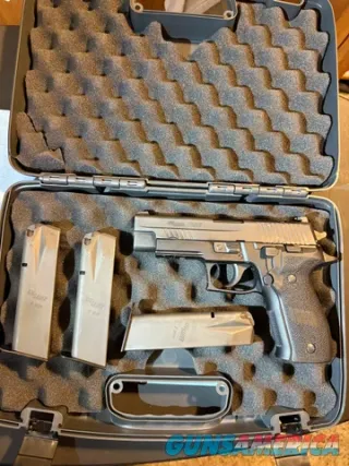 SIG Sauer P226 9mm with three magazines ...