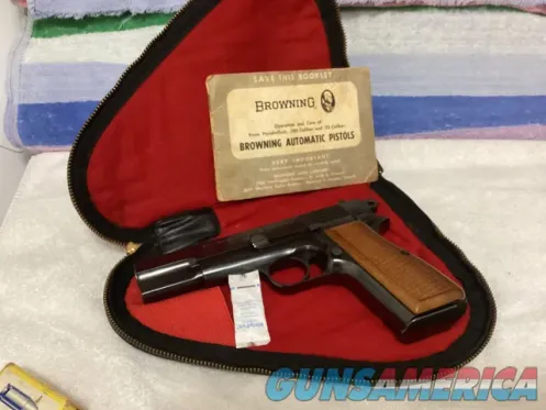 Browning Hi-Power 9mm with pouch and man...