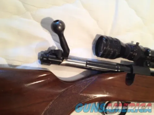 Classic Bolt-Action Hunting Rifle with S...
