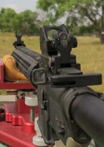 With the CQS mounted forward of the backup iron sights, both can used together.