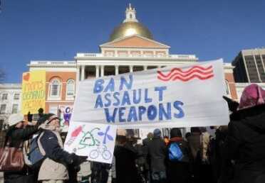 5 tips for winning hearts, minds of anti-gunners (012613 Boston, MA) People hold signs during a rally of One Million Moms for Gun Control in front of the Massachusetts Statehouse in Boston, Saturday, Jan. 26, 2013. Photo: Chitose Suzuki