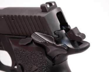 Like a 1911, you carry the Sig P226 Elite SAO cocked and locked. Note the big beavertail.
