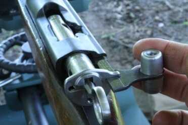 The Swiss K31 is a straight pull rifle. The bolt works on a rotating cam, similar to an AR-15. Finger pressure open and closes the bolt and the action is smooth and clean.
