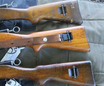 The top rifle is the old gun. The beech stocks on many of the old guns have worn away for some reason. The second gun is the new unissued beech rifles, and the bottom is the walnut stock.