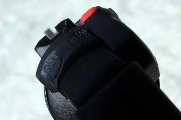 The black on black sights are difficult to see in the dark, but the laser makes up for that. 