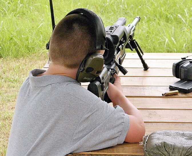 This whisp of a young man had no trouble handling the recoil of the .338 Lapua Magnum. In fact, he scored a bullseye.
