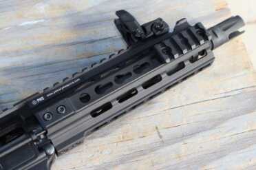 The 7.5 inch barrel is short, but long enough. The flash hider disipates the flash well, but not the noise.