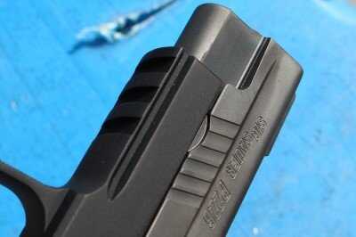 Accessory rail on front of SIG P226 TacOps frame