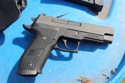SIG Sauer P226 TacOps full-size 9mm pistol showing classic P226 profile