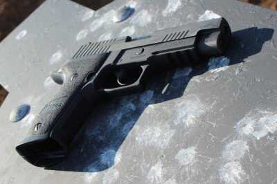 Full-size SIG P226 TacOps showing wide profile for concealed carry