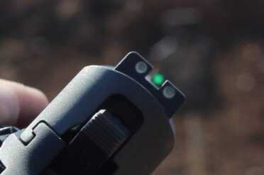 When lining up the sights, the green dot hampers my ability to thread the needle. But it fast, and easy to see, and this is not a target pistol--so no complaints.