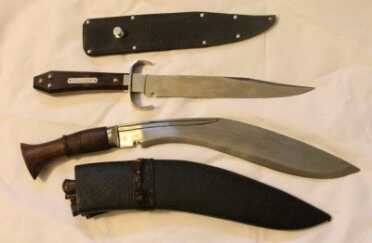 Bowie Knife vs. Kukri Knife - What's Your Fighting Knife? The top one is my Ontario Hell's Belle. I like the belt button sheath, the coffin shaped handle, and the overall weight and balance.