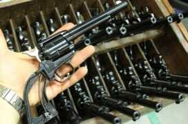 Taurus USA Firearm Factory - Miami Florida - Photo Essay Cowboy .22s on their way to final assembly.