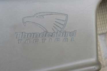 The Thunderbird Tactical logo is emblazoned on the side of the rifle.