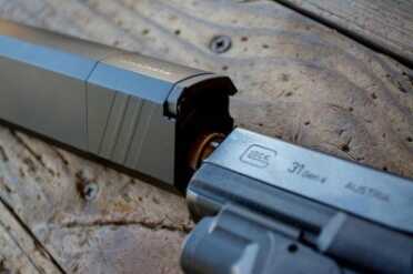 SilencerCo's Osprey Suppressor Is One Cool Bird When you screw the Osprey on to the barrel, it may end up like this. No worries, that's what the clutch lever is for.