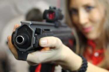 LWRC's New .45 ACP Sub Gun--SHOT Show 2015 Beautiful and deadly, and I'm not talking about the girl.