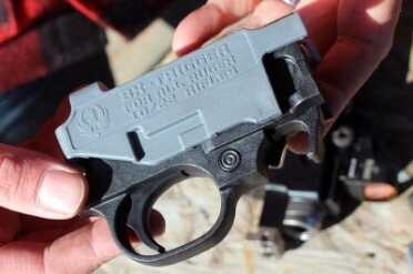 New Ruger BX-Trigger For 10/22 The BX-Trigger. The grey part comes off before you install the trigger, it is there to let you dry fire.