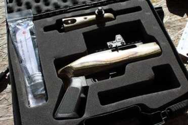 The Takedown, shown here with a Trijicon RMR, comes in a plastic case with pre-cut foam. 