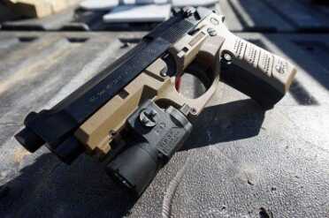 Recover that Beretta m9 The M9 with the ReCover installed.