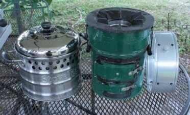The $118 StoveTec rocket stove (middle), the StoveTec $59 pot (left) and the included pot skirt.