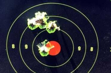 1,000 Yards from a 0 Rifle - Ruger's American Predator 100 yards, top group is one 4 shot group from bipod. Bottom group is 2 shot group after sight adjustment.