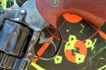 The Best Revolver Ever Made? Colt's Python--Review Same gun, same drill, different shooter. He didn't have the double-action touch.
