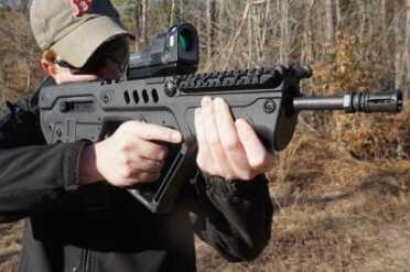 Israel Defense Forces IWI Tavor Review There's not much room on the front of the gun for hand holds, and the high-C grip is all but impossible.