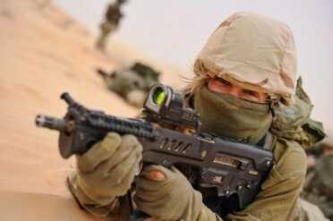Israel Defense Forces IWI Tavor Review The actual IDF gun. IWI is replicating them in the US, and you can buy one. Blonde not included.