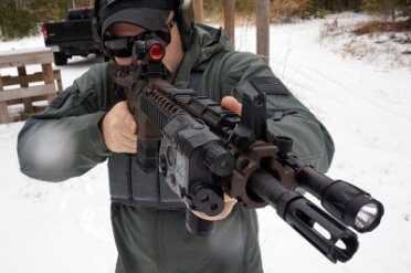 The pinned and welded muzzle device will prevent you from attaching a supressor, but it keep the overall length down. And it can be replaced. 