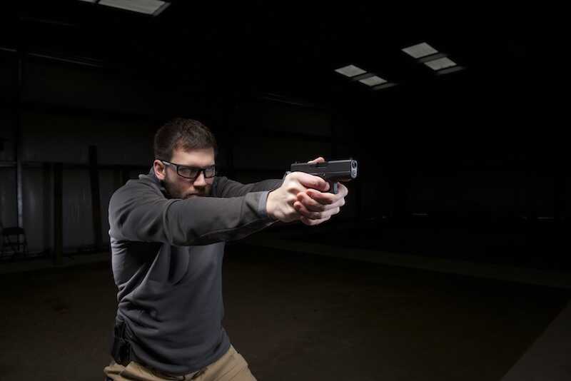Shooter firing the compact Glock G43 9mm during the original Glock factory range test