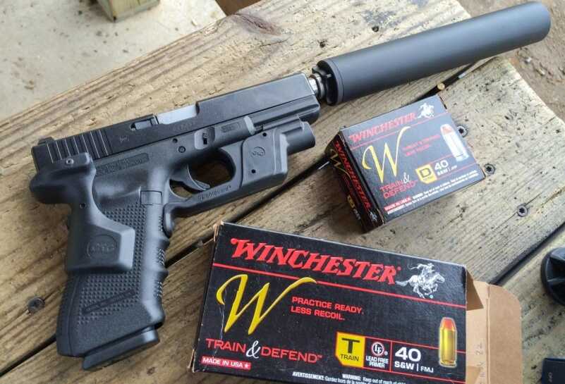 One hidden benefit to this configuration is that the Crimson Trace Lasergrips clear the suppressor body.