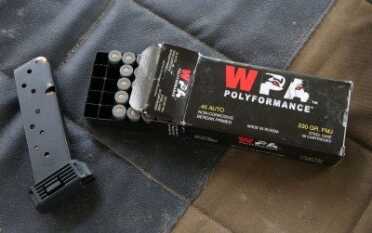 The magazine holds 9 rounds of 45ACP. BEWARE that aftermarket high-cap mags can void the warranty on these guns. 