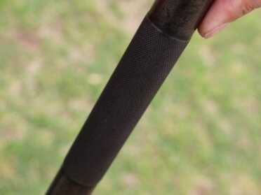 Grip on the barrel.