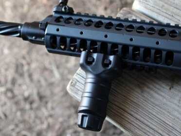 LWRC Tricon MK6--The Refined Fighting Carbine The rail can be configured as you'd like, but comes with a Magpul fore grip.