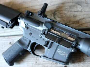 LWRC Tricon MK6--The Refined Fighting Carbine The Tricon logo is not terribly large, but it is present on the mag well.