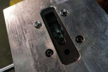 The milling inside will almost surely show tool marks, but that won't change how it functions.