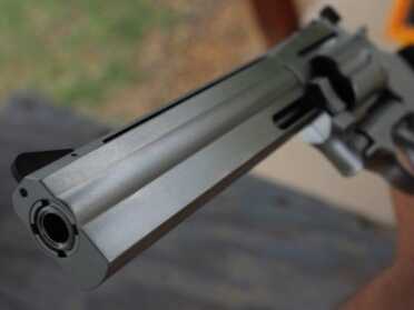The barrel shroud is heavy, which helps to hold the gun down. 