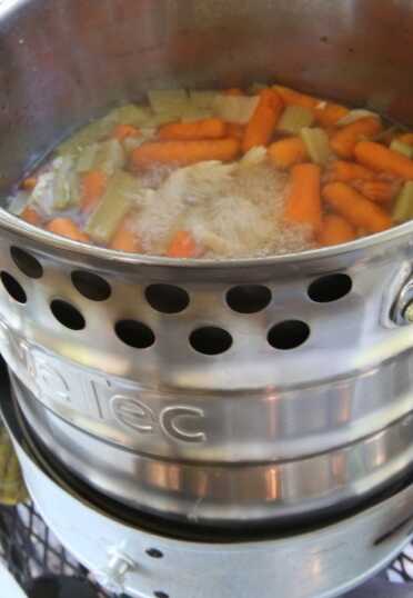 Prepping 101: Rocket Stove Canning For my second batch, I decided to can some leftover chicken soup. Hot soup has the same canning time as raw veggies if you boil the soup first, so I used the handy rocket stove pot.