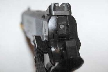 Gun Review: Springfield Armory 1911 TRP The low-profile combat sights have tritium inserts for night use.