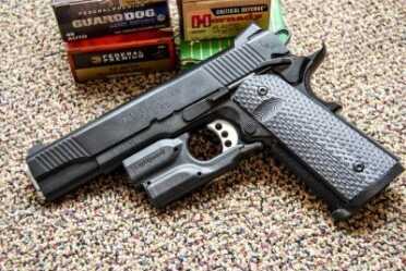 Gun Review: Springfield Armory 1911 TRP While not specified as a compatible match, this Crimson Trace Lightguard fit perfectly.