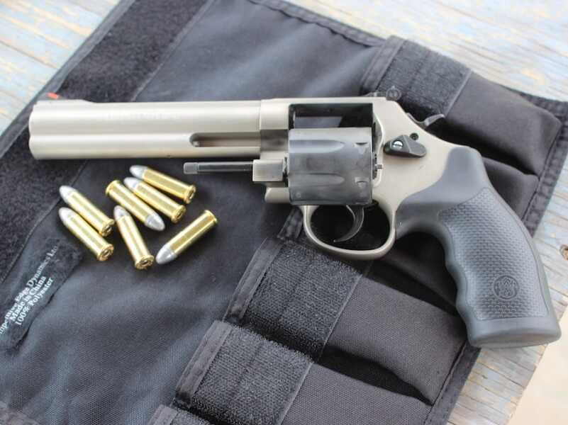 Shoot-out: Colt Python vs. Smith & Wesson 686 Proof that I'm not concerned about preserving the reputation of this not-a-safe-queen? I had the whole thing coated by WMD. Now she's even easier to keep clean.