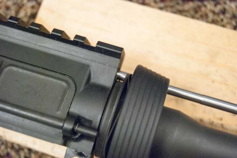 Build an AR-15: Choosing and Installing the Barrel Make sure you line up holes in the barrel nut with the gas tube hole in the upper receiver.