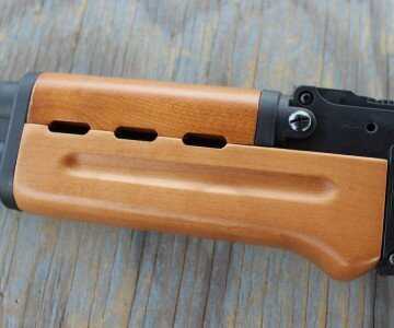 Mossberg's New Rimfire AK--The Blaze 47 The handguard is wooden, and much easier to get on and off than that or a genuine AK.