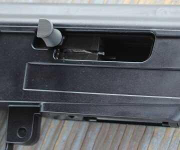 Mossberg's New Rimfire AK--The Blaze 47 The charging handle is easy to find, and moves the bolt with almost no effort.