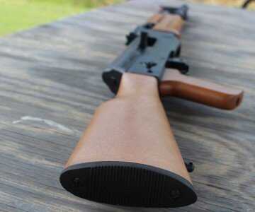 Mossberg's New Rimfire AK--The Blaze 47 The wooden stock pins into the receiver.