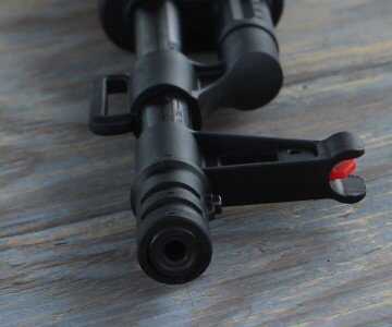 Mossberg's New Rimfire AK--The Blaze 47 Don't be fooled by the cap on the barrel. I'd hoped to find threads under it, but didn't. There is more than enough barrel to thread. But removing the cap removes the front sight.