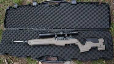 This is the new Springfield M1A Loaded with a polymer Precision Stock. It comes with this case that is large enough to accommodate the rifle with a scope. 